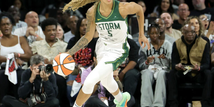 LAS VEGAS, NEVADA - SEPTEMBER 22: Gabby Williams #5 of the Seattle Storm brings the ball up the court against the Las Vegas Aces in the first quarter of Game One of the 2024 WNBA Playoffs first round at Michelob ULTRA Arena on September 22, 2024 in Las Vegas, Nevada. The Aces defeated the Storm 78-67. NOTE TO USER: User expressly acknowledges and agrees that, by downloading and or using this photograph, User is consenting to the terms and conditions of the Getty Images License Agreement. (Photo by Ethan Miller/Getty Images)