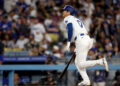 LOS ANGELES, CALIFORNIA - SEPTEMBER 10: Shohei Ohtani #17 of the Los Angeles Dodgers reacts to his fly out during the eighth inning against the Chicago Cubs at Dodger Stadium on September 10, 2024 in Los Angeles, California. (Photo by Harry How/Getty Images)