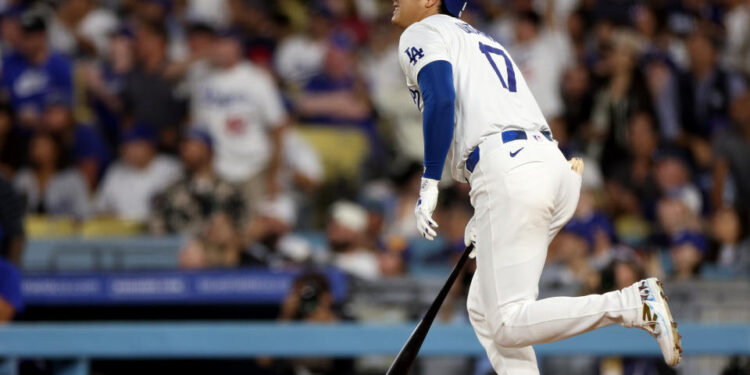 LOS ANGELES, CALIFORNIA - SEPTEMBER 10: Shohei Ohtani #17 of the Los Angeles Dodgers reacts to his fly out during the eighth inning against the Chicago Cubs at Dodger Stadium on September 10, 2024 in Los Angeles, California. (Photo by Harry How/Getty Images)