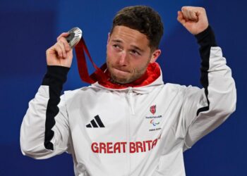 Silver medalist Alfie Hewett of Great Britain on the podium of the men's Wheelchair Tennis Singles, Paris 2024 Summer Paralympic Games, Roland Garros, September 7, 2024