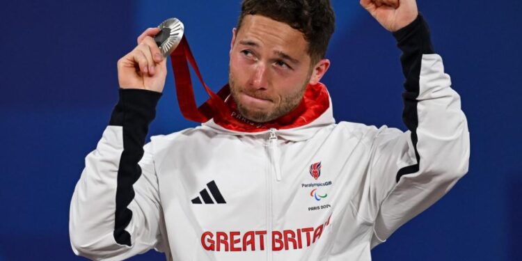 Silver medalist Alfie Hewett of Great Britain on the podium of the men's Wheelchair Tennis Singles, Paris 2024 Summer Paralympic Games, Roland Garros, September 7, 2024