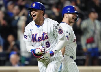 Sep 22, 2024; New York City, New York, USA; New York Mets left fielder Brandon Nimmo (9) reacts to hitting a home run as he rounds the bases against the Philadelphia Phillies during the sixth inning at Citi Field.