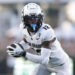 FORT COLLINS, COLORADO - SEPTEMBER 14: Travis Hunter #12 of the Colorado Buffaloes runs with the ball during the second quarter against the Colorado State Rams at Canvas Stadium on September 14, 2024 in Fort Collins, Colorado. (Photo by Andrew Wevers/Getty Images)