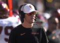 Southern California head coach Lincoln Riley watches against Michigan in the first half.