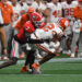 ATLANTA, GA - AUGUST 31: Georgia Bulldogs defensive back Daniel Harris (7) tackles Clemson Tigers wide receiver Bryant Wesco Jr. (12) during the AFLAC Kickoff Game between the Clemson Tigers and the Georgia Bulldogs on August 31, 2024, at Mercedes-Benz Stadium in Atlanta, Ga. (Photo by Jeffrey Vest/Icon Sportswire via Getty Images)