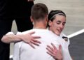 Indiana Fever guard Caitlin Clark hugs her boy friend Connor McCaffery