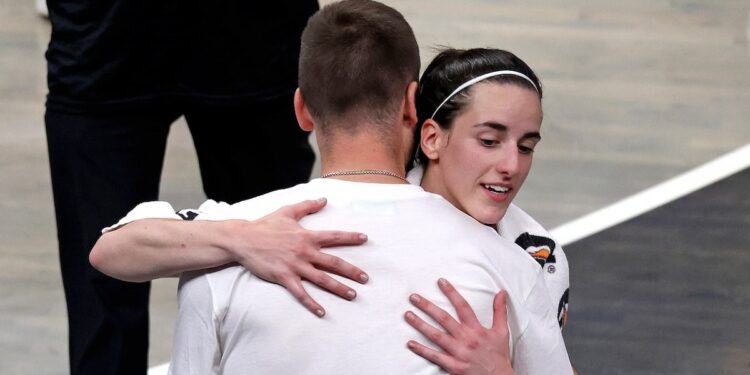 Indiana Fever guard Caitlin Clark hugs her boy friend Connor McCaffery