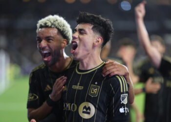 LOS ANGELES, CALIFORNIA - SEPTEMBER 25: Omar Campos #2 of Los Angeles FC celebrates his goal with Timothy Tillman #11 during extra time of the finals against Sporting Kansas City during the 2024 Lamar Hunt U. S. Open Cup at BMO Stadium on September 25, 2024 in Los Angeles, California.  (Photo by Michael Owens/USSF/Getty Images for USSF)