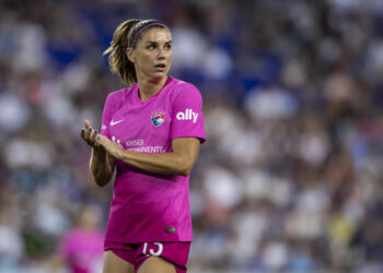 HARRISON, NEW JERSEY - JUNE 19: Alex Morgan #13 of San Diego Wave FC claps for teammate effort in the second half of the National Women's Soccer League match against the NJ/NY Gotham FC at Red Bull Arena on June 19, 2024 in Harrison, New Jersey. (Photo by Ira L. Black - Corbis/Getty Images)