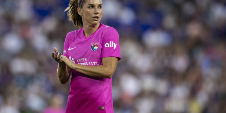 HARRISON, NEW JERSEY - JUNE 19: Alex Morgan #13 of San Diego Wave FC claps for teammate effort in the second half of the National Women's Soccer League match against the NJ/NY Gotham FC at Red Bull Arena on June 19, 2024 in Harrison, New Jersey. (Photo by Ira L. Black - Corbis/Getty Images)