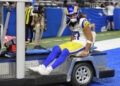 Sep 8, 2024; Detroit, Michigan, USA; Los Angeles Rams wide receiver Puka Nacua (17) is carted off the field after being injured against the Detroit Lions in the first half at Ford Field. Mandatory Credit: Lon Horwedel-Imagn Images