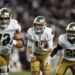 COLLEGE STATION, TEXAS - AUGUST 31: Riley Leonard #13 of the Notre Dame Fighting Irish runs the ball as Sam Pendleton #72 and Devyn Ford #22 block against the Texas A&M Aggies at Kyle Field on August 31, 2024 in College Station, Texas. (Photo by Jack Gorman/Getty Images)