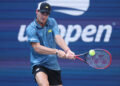 NEW YORK, NEW YORK - AUGUST 31: Tommy Paul of the United States returns a shot against Gabriel Diallo of Canada during their Men's Singles Third Round match on Day Six of the 2024 US Open at USTA Billie Jean King National Tennis Center on August 31, 2024 in the Flushing neighborhood of the Queens borough of New York City. (Photo by Matthew Stockman/Getty Images)