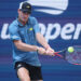 NEW YORK, NEW YORK - AUGUST 31: Tommy Paul of the United States returns a shot against Gabriel Diallo of Canada during their Men's Singles Third Round match on Day Six of the 2024 US Open at USTA Billie Jean King National Tennis Center on August 31, 2024 in the Flushing neighborhood of the Queens borough of New York City. (Photo by Matthew Stockman/Getty Images)