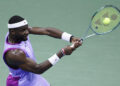 USA's Frances Tiafoe hits a return to Bulgaria's Grigor Dimitrov during their men's quarterfinals match on day nine of the US Open tennis tournament at the USTA Billie Jean King National Tennis Center in New York City, on September 3, 2024. (Photo by Kena Betancur / AFP) (Photo by KENA BETANCUR/AFP via Getty Images)