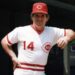 Pete Rose poses on dugout