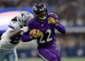 Baltimore Ravens running back Derrick Henry (22) rushes for a touchdown in a win over the Cowboys. (AP Photo/Gareth Patterson)