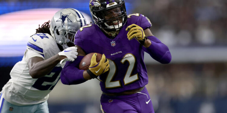 Baltimore Ravens running back Derrick Henry (22) rushes for a touchdown in a win over the Cowboys. (AP Photo/Gareth Patterson)