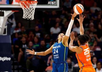 MINNEAPOLIS, MINNESOTA - JULY 04: Napheesa Collier #24 of the Minnesota Lynx blocks a shot by Alyssa Thomas #25 of the Connecticut Sun in the third quarter at Target Center on July 04, 2024 in Minneapolis, Minnesota. The Sun defeated the Lynx 78-73. (Photo by David Berding/Getty Images)