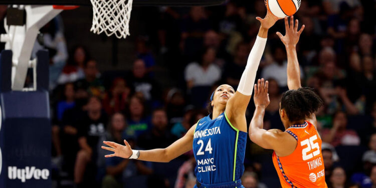 MINNEAPOLIS, MINNESOTA - JULY 04: Napheesa Collier #24 of the Minnesota Lynx blocks a shot by Alyssa Thomas #25 of the Connecticut Sun in the third quarter at Target Center on July 04, 2024 in Minneapolis, Minnesota. The Sun defeated the Lynx 78-73. (Photo by David Berding/Getty Images)