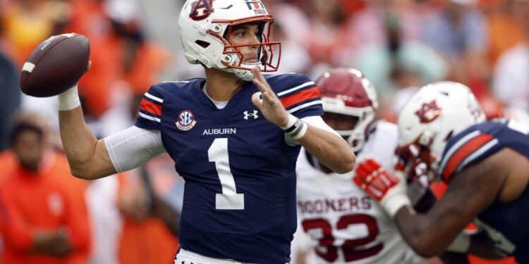 Auburn quarterback Payton Thorne (1) throws a pass during the first half of an NCAA college football game against Oklahoma, Saturday, Sept. 28, 2024, in Auburn, Ala. (AP Photo/Butch Dill)