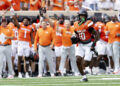 Oklahoma State cornerback Kale Smith (10) returns a interception for a touchdown in the first half of an NCAA college football game against Arkansas, Saturday, Sept. 7, 2024, in Stillwater, Okla. (AP Photo/Mitch Alcala)