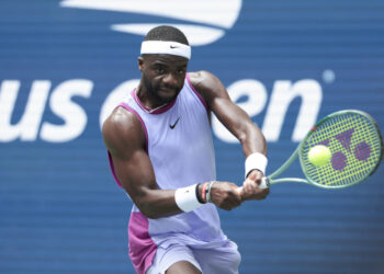 NEW YORK, NEW YORK - AUGUST 30: Frances Tiafoe of USA against Ben Shelton of USA during their Men's Singles Third Round match on Day Five of the 2024 US Open at USTA Billie Jean King National Tennis Center on August 30, 2024 in the Flushing neighborhood of the Queens borough of New York City.  (Photo by Jean Catuffe/Getty Images)