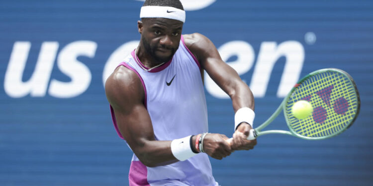 NEW YORK, NEW YORK - AUGUST 30: Frances Tiafoe of USA against Ben Shelton of USA during their Men's Singles Third Round match on Day Five of the 2024 US Open at USTA Billie Jean King National Tennis Center on August 30, 2024 in the Flushing neighborhood of the Queens borough of New York City.  (Photo by Jean Catuffe/Getty Images)