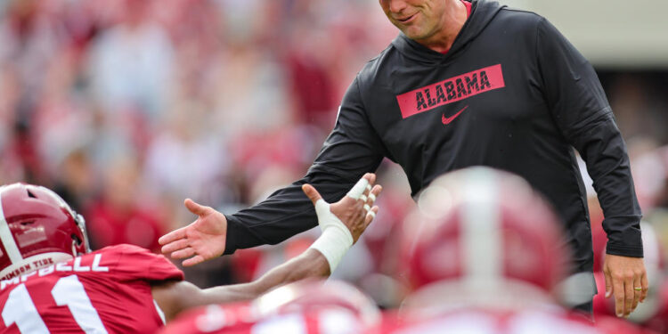 TUSCALOOSA, ALABAMA - AUGUST 31: Head coach Kalen DeBoer of the Alabama Crimson Tide encourages his  prior to kickoff against the Western Kentucky Hilltoppers at Bryant-Denny Stadium on August 31, 2024 in Tuscaloosa, Alabama. (Photo by Brandon Sumrall/Getty Images)