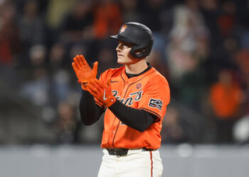 SAN FRANCISCO, CALIFORNIA - AUGUST 30: Matt Chapman #26 of the San Francisco Giants reacts after hitting a three-run double in the bottom of the eighth inning against the Miami Marlins at Oracle Park on August 30, 2024 in San Francisco, California. (Photo by Lachlan Cunningham/Getty Images)