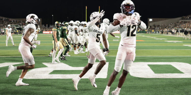 FORT COLLINS, COLORADO - SEPTEMBER 14: Travis Hunter #12 of the Colorado Buffaloes celebrates after scoring a touchdown during the third quarter against the Colorado State Rams at Canvas Stadium on September 14, 2024 in Fort Collins, Colorado. (Photo by Andrew Wevers/Getty Images)