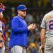 Sep 28, 2024; Milwaukee, Wisconsin, USA; New York Mets manager Carlos Mendoza makes a pitching change in the eighth inning against the Milwaukee Brewers at American Family Field.