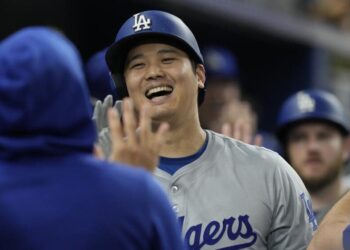 Los Angeles Dodgers' Shohei Ohtani (17) celebrates his 51 home run of the season.