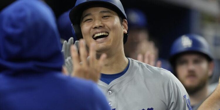 Los Angeles Dodgers' Shohei Ohtani (17) celebrates his 51 home run of the season.