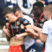 Blackburn Rovers' Owen Beck seems to be bitten on the neck by Preston North End's Milutin Osmajic during a match. (Dave Howarth - CameraSport via Getty Images)