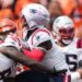 Jabrill Peppers of New England Patriots is hit by Joe Burrow of Cincinnati Bengals