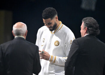 BOSTON, MASSACHUSETTS - OCTOBER 22: Jayson Tatum #0 of the Boston Celtics receives his championship ring from Boston Celtics owners Robert Epstein and Wyc Grousbeck prior to the game against the New York Knicks at TD Garden on October 22, 2024 in Boston, Massachusetts. (Photo by Brian Fluharty/Getty Images)