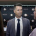 San Francisco Giants president of baseball operations Buster Posey speaks with people after a news conference in San Francisco, Tuesday, Oct. 1, 2024. (AP Photo/Jeff Chiu)