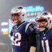 FOXBOROUGH, MASSACHUSETTS - JANUARY 04: Tom Brady #12 of the New England Patriots and Julian Edelman #11 look on after Edelman scored a touchdown in the second quarter of the AFC Wild Card Playoff game at Gillette Stadium on January 04, 2020 in Foxborough, Massachusetts. (Photo by Maddie Meyer/Getty Images)