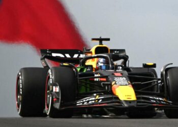 Red Bull's Max Verstappen in US Grand Prix practice with the Texas flag in the background