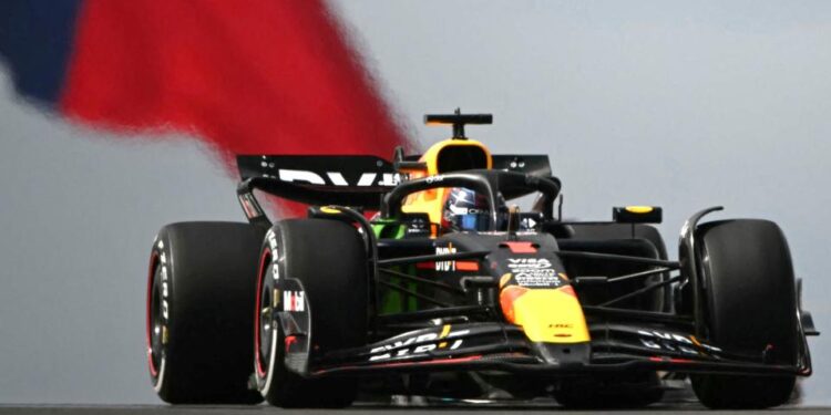 Red Bull's Max Verstappen in US Grand Prix practice with the Texas flag in the background