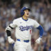 Los Angeles Dodgers' Shohei Ohtani reacts after hitting a three-run home run during the second inning in Game 1 of baseball's NL Division Series against the San Diego Padres, Saturday, Oct. 5, 2024, in Los Angeles. (AP Photo/Mark J. Terrill)