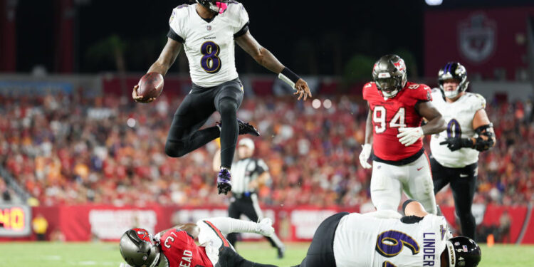 Lamar Jackson tied his own Ravens record with five touchdown passes on Monday. (Nathan Ray Seebeck-Imagn Images)