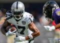 Sep 15, 2024; Baltimore, Maryland, USA; Las Vegas Raiders wide receiver Davante Adams (17) runs with the ball as Baltimore Ravens cornerback Marlon Humphrey (44) defends during the second half at M&T Bank Stadium. Mandatory Credit: Reggie Hildred-Imagn Images