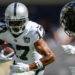 Sep 15, 2024; Baltimore, Maryland, USA; Las Vegas Raiders wide receiver Davante Adams (17) runs with the ball as Baltimore Ravens cornerback Marlon Humphrey (44) defends during the second half at M&T Bank Stadium. Mandatory Credit: Reggie Hildred-Imagn Images