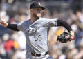 Sep 22, 2024; San Diego, California, USA; Chicago White Sox starting pitcher Sean Burke (59) pitches against the San Diego Padres during the first inning at Petco Park. Mandatory Credit: Orlando Ramirez-Imagn Images