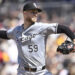 Sep 22, 2024; San Diego, California, USA; Chicago White Sox starting pitcher Sean Burke (59) pitches against the San Diego Padres during the first inning at Petco Park. Mandatory Credit: Orlando Ramirez-Imagn Images