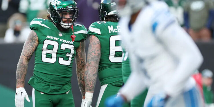 EAST RUTHERFORD, NEW JERSEY - DECEMBER 18: Tyler Conklin #83 of the New York Jets looks on against the Detroit Lions at MetLife Stadium on December 18, 2022 in East Rutherford, New Jersey. credits: by Sarah Stier | source: Getty Images