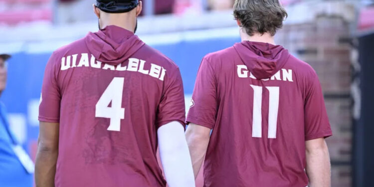 Sep 28, 2024; Dallas, Texas, USA; Florida State Seminoles quarterback DJ Uiagalelei (4) and quarterback Brock Glenn (11) before the game between the Southern Methodist Mustangs and the Florida State Seminoles at Gerald J. Ford Stadium. Mandatory Credit: Jerome Miron-Imagn Images