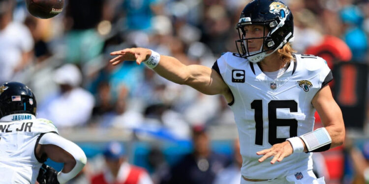 Jacksonville Jaguars quarterback Trevor Lawrence attempts a pass. PHOTO USA Today Sports Images